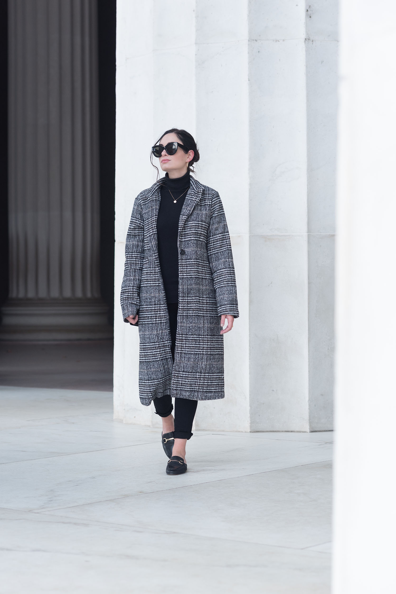 Winnipeg fashion blogger Cee Fardoe of Coco & Vera walks at the Lincoln Memorial wearing a Sheinside coat and Jonak mules