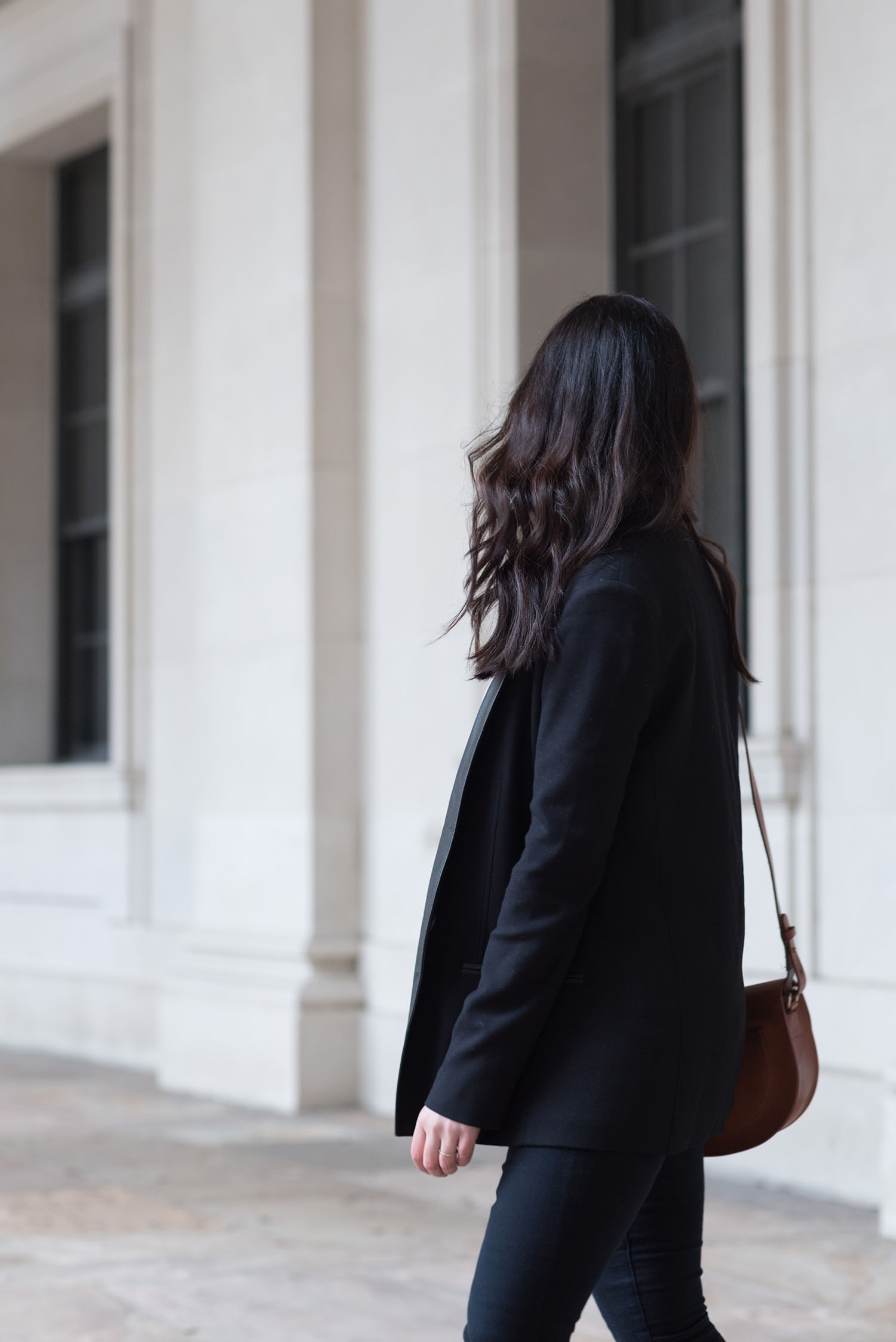 Portrait of Winnipeg fashion blogger Cee Fardoe of Coco & Vera, wearing a Helmut Lang blazer and carrying a Sezane Claude bag