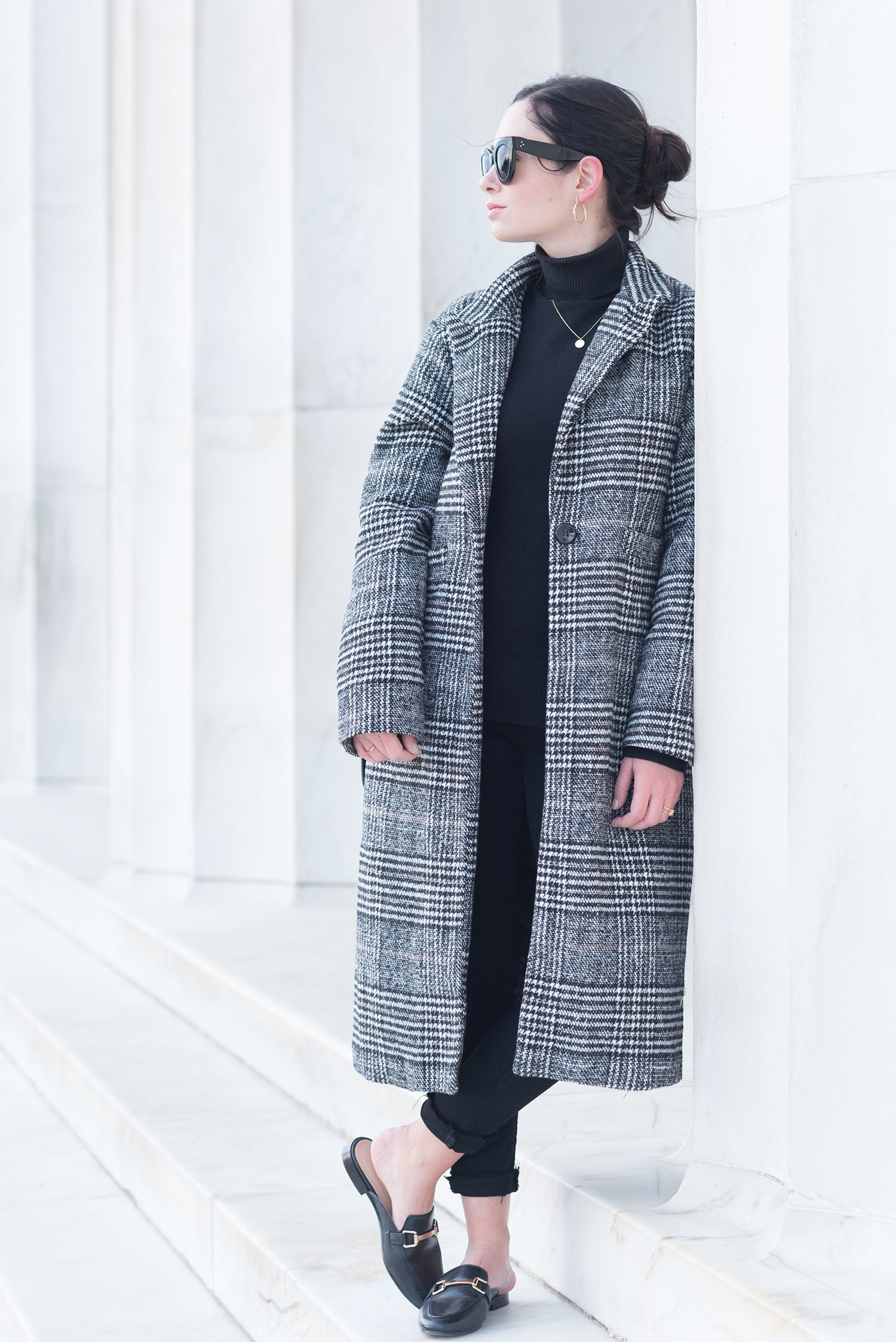 Fashion blogger Cee Fardoe of Coco & Vera stands at the Lincoln Memorial in Washington DC wearing a Sheinside coat and Jonak mules