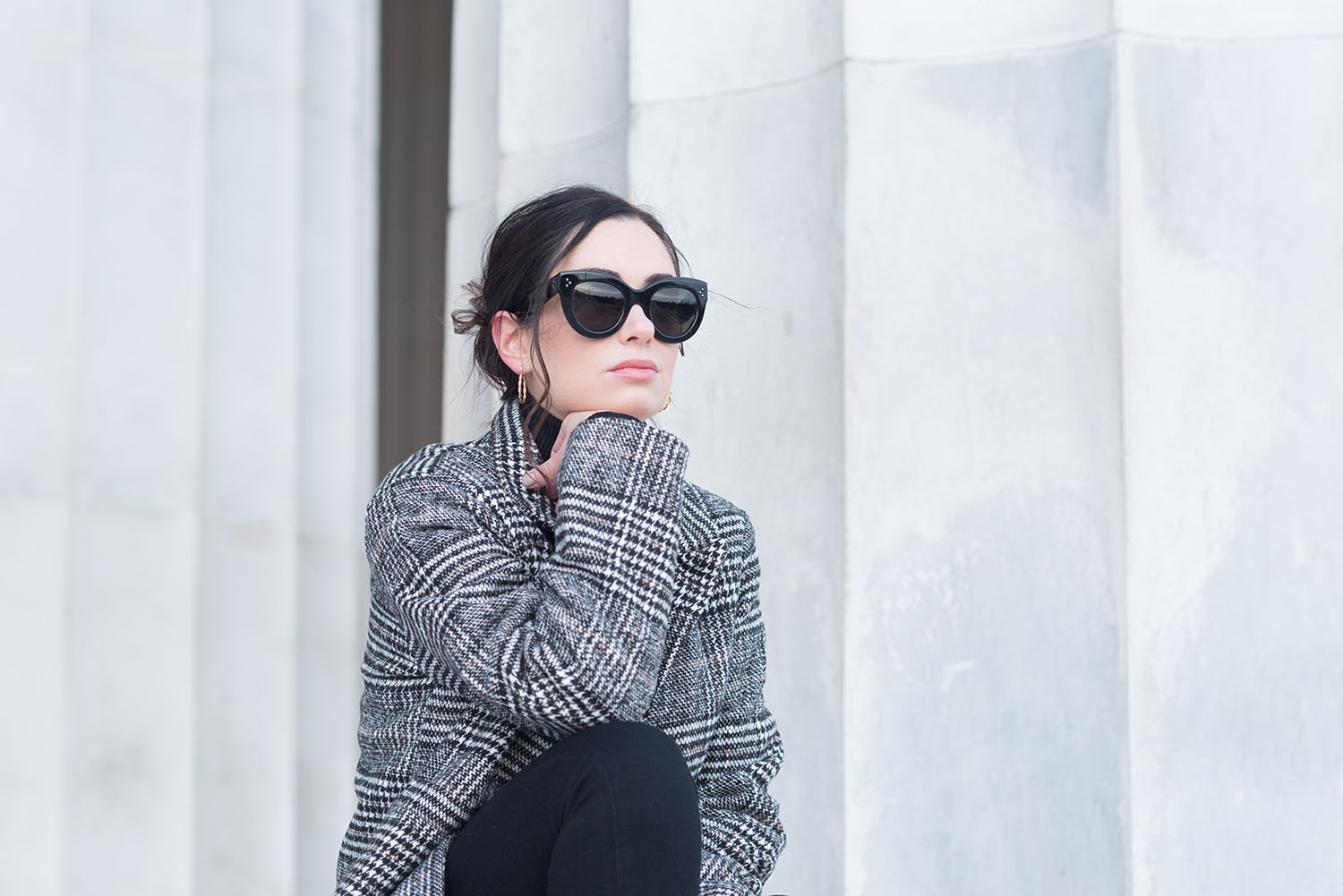 Portrait of Canadian fashion blogger Cee Fardoe of Coco & Vera at the Lincoln Memorial in Washington DC, wearing a Sheinside tartan coat and Celine Audrey sunglasses