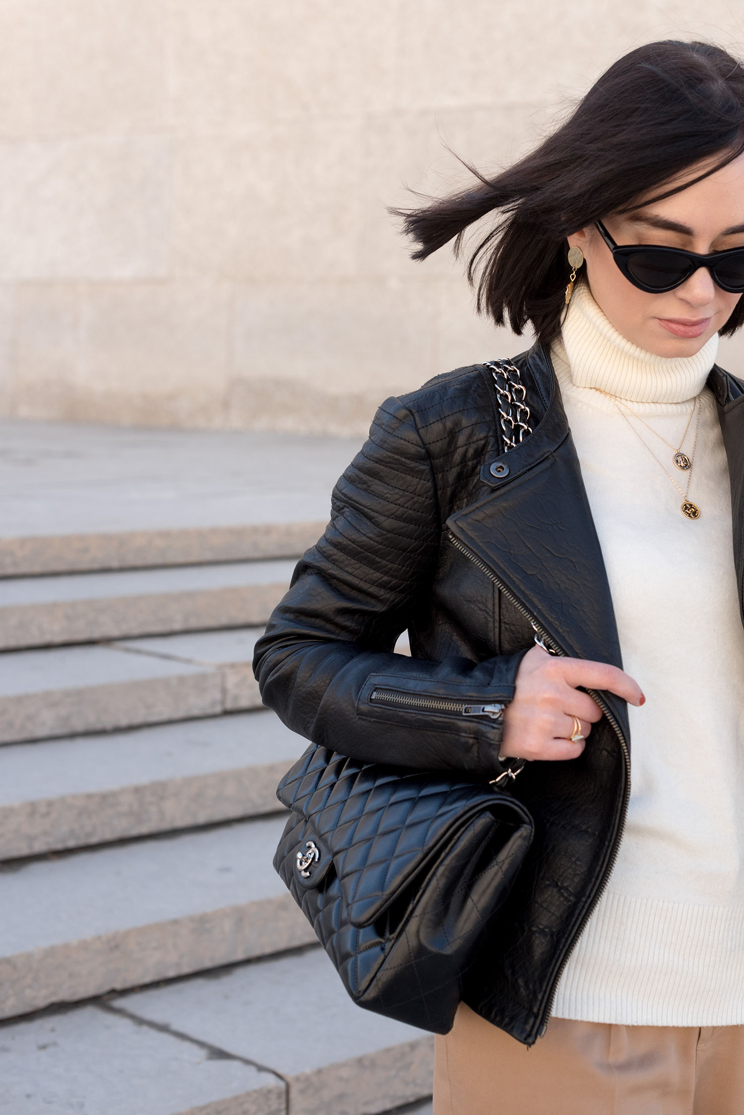 Portrait of top Canadian fashion blogger Cee Fardoe of Coco & Vera wearing Elizabeth Lyn Jewelry Cee earrings and carrying a Chanel jumbo handbag