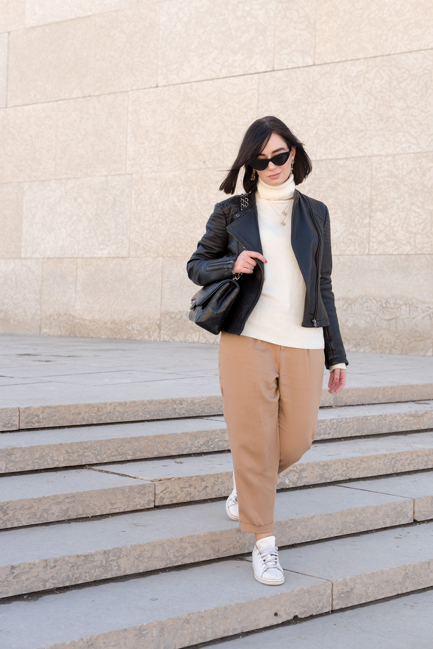 Top Winnipeg fashion blogger Cee Fardoe of Coco & Vera at the Winnipeg Art Gallery, wearing a Noul turtleneck sweater and Zara beige trousers